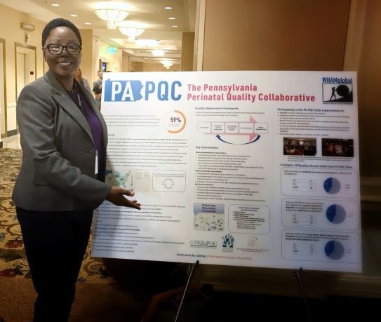 Nakiryowa with her PAPQC poster at Adagio Health's symposium